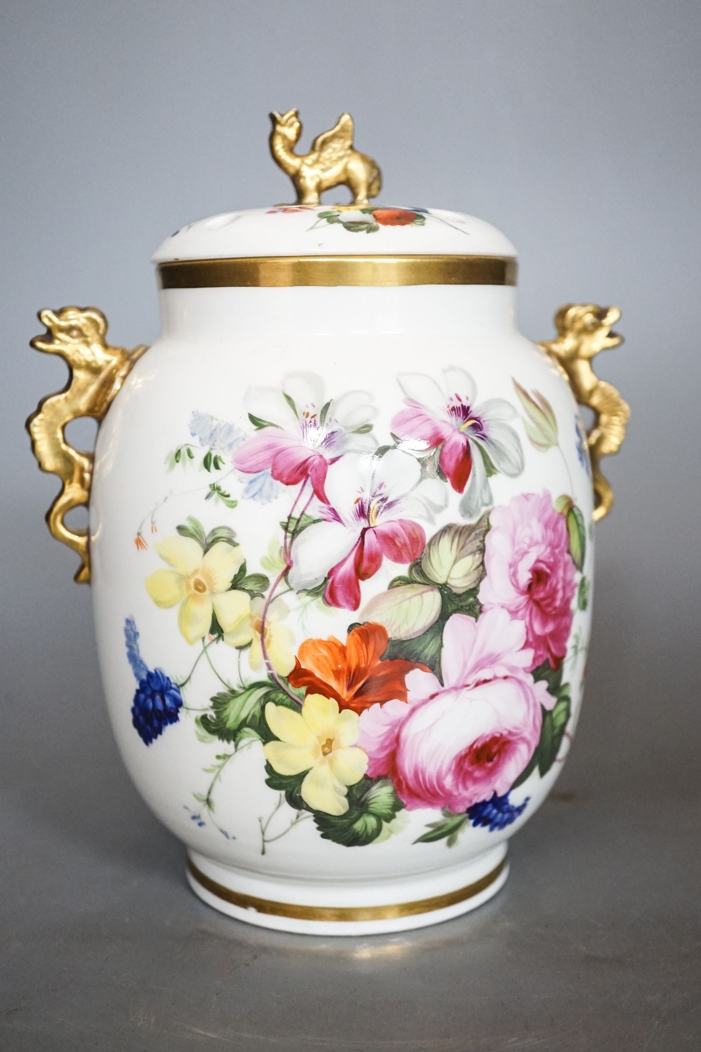 An English porcelain pot pourri vase, cover and inner cover, probably Coalport, painted with roses and flowers 21cm